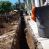 Obras Sanitarias realiza un recambio de una antigua cañería cloacal en el Barrio Desiderio de la Fuente